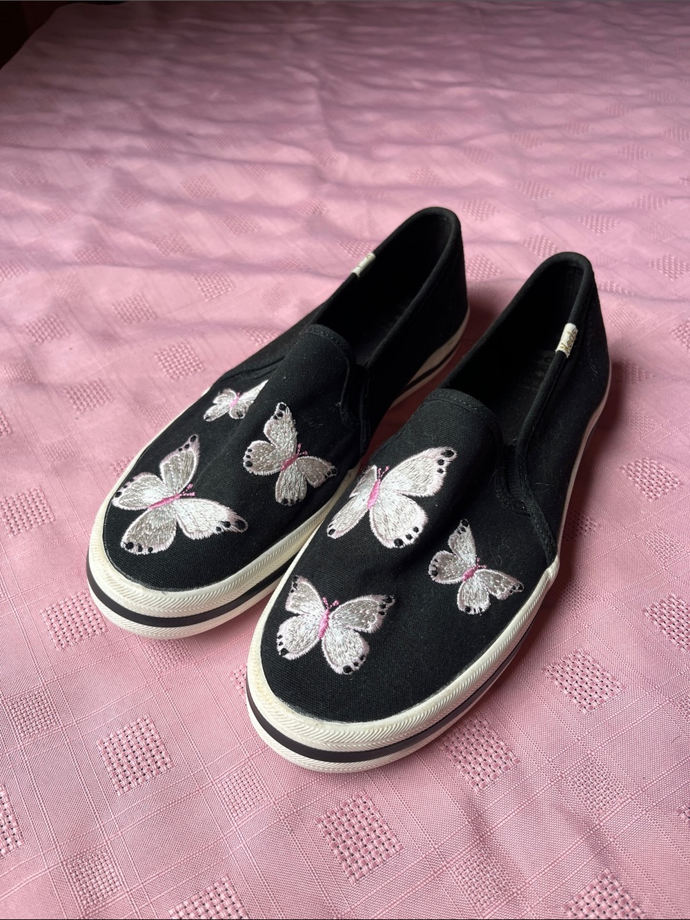 kate spade Black Slip-On Sneakers with White & Pink Butterfly Embroidery